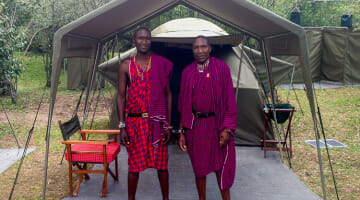 Maasai in front of tent