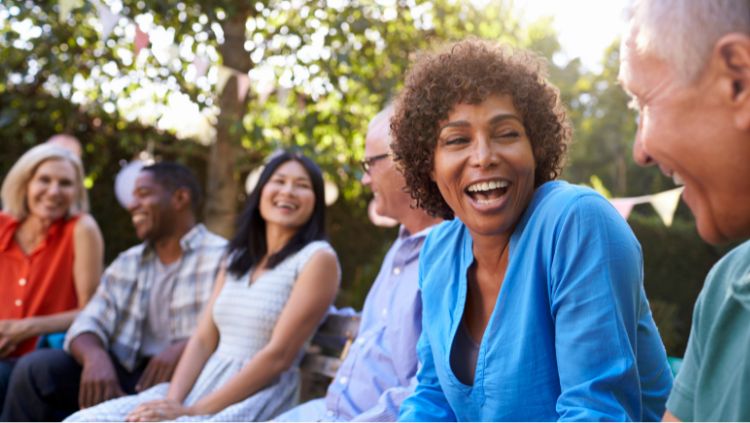 solo travelers over 50 on park bench