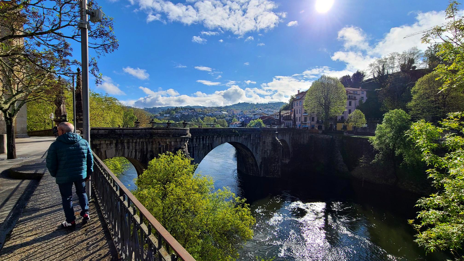 A solo traveler strolls around Amarante, one of the excursions from the Avalon river cruise on the Douro