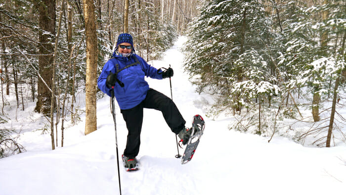 image, Woman snow shoeing, winter travel fun