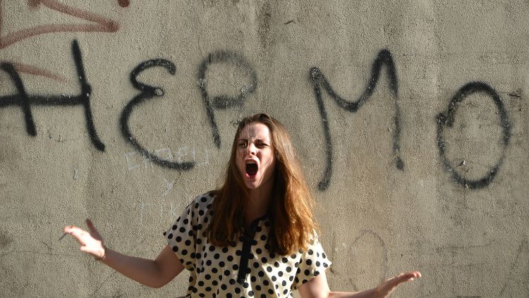 For solo female travel safety, learn to scream, like this woman on the street, just in case