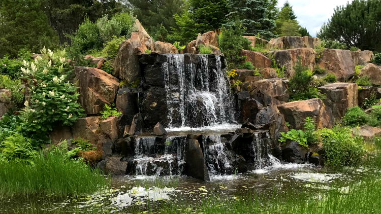 A waterfall in New Brunswick, shared by a solo traveler on a road trip across Canada